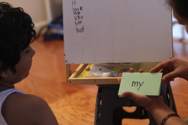 A split-screen image showing an original, wordy sentence on one side and a revised, concise version of the same sentence on the other. The image visually demonstrates the impact of concise writing.