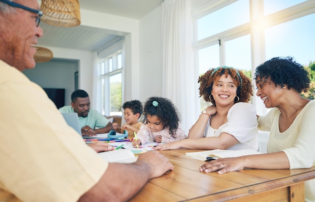 A group of diverse parents and teachers sitting around a table in a school meeting room, discussing mental health support strategies. There are charts and documents on the table, and everyone appears engaged and collaborative.