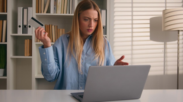A person using a computer, focusing on an online form for disputing a credit report error, with a concerned expression, emphasizing the importance of accuracy.