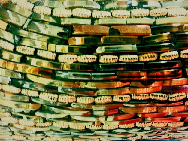 A split image showing on one side a stack of cash being slowly burned, symbolizing the loss of value due to inflation, and on the other side, a healthy, green plant growing, representing investments growing faster than inflation.