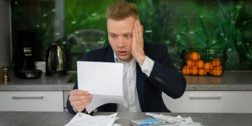 Debt Snowball vs. Avalanche: Finance Tips to Pay Off Debt Faster - Cover Image